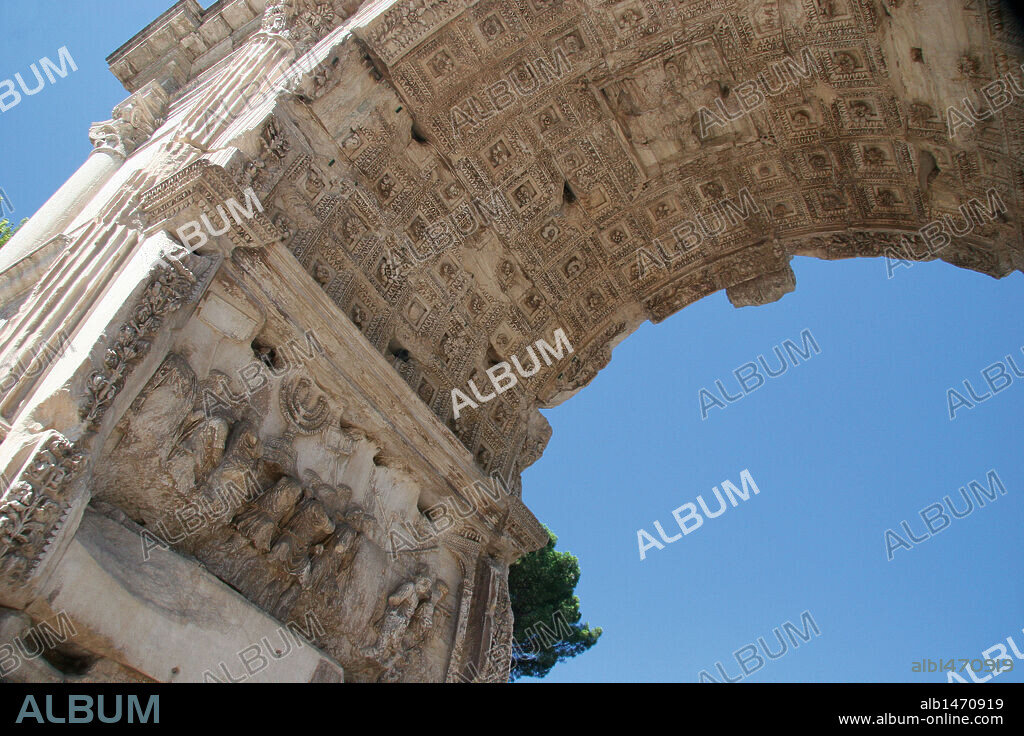 Roman Art. Arch of Titus. Triumphal arch, with a single arched, located on the Via Sacra. South-East of the Forum. It was constructed by the emperor Domitian commemorating the capture and sack of Jerusalem in 70 (Jewish war). Detail from the arch of Titus showing spoil from the sack of Jerusalem. Rome. Italy. Europe.