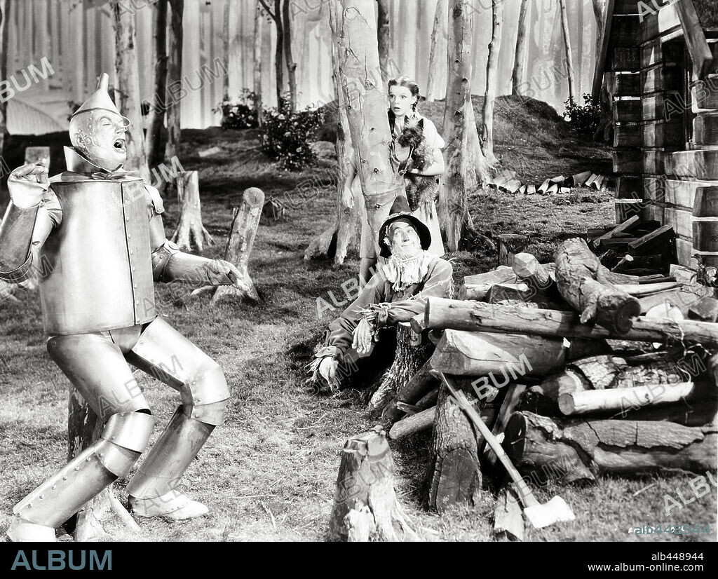 JACK HALEY, JUDY GARLAND and RAY BOLGER in THE WIZARD OF OZ, 1939, directed by VICTOR FLEMING. Copyright M.G.M.