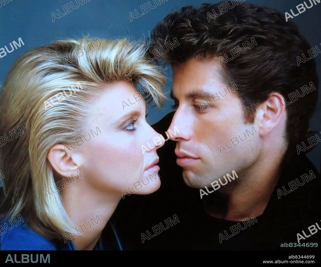 JOHN TRAVOLTA und OLIVIA NEWTON-JOHN in ZWEI VOM GLEICHEN SCHLAG, 1983 (TWO OF A KIND), unter der Regie von JOHN HERZFELD. Copyright 20TH CENTURY FOX.