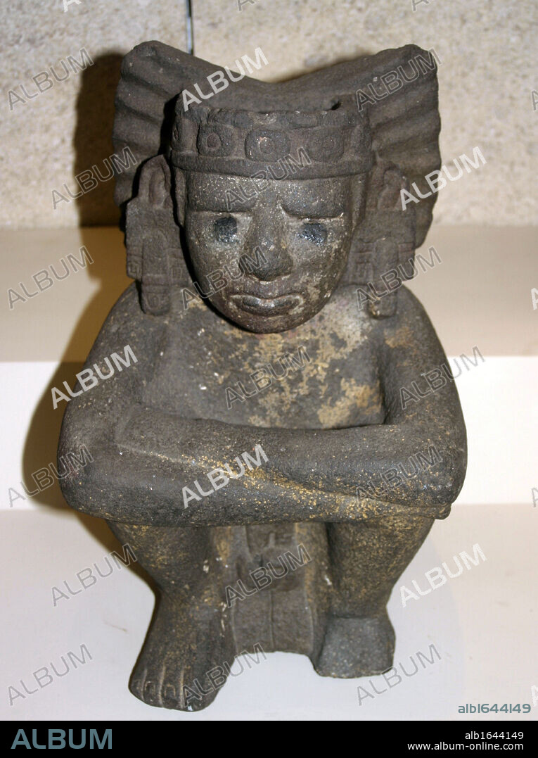 Seated stone figure of Xiuhtecuhtli: Aztec, AD 1325-1521, from Mexico. Xiuhtecuhtli, was the Aztec god of fire. Pre-Columbian Mesoamerican Mythology. Sculpture.