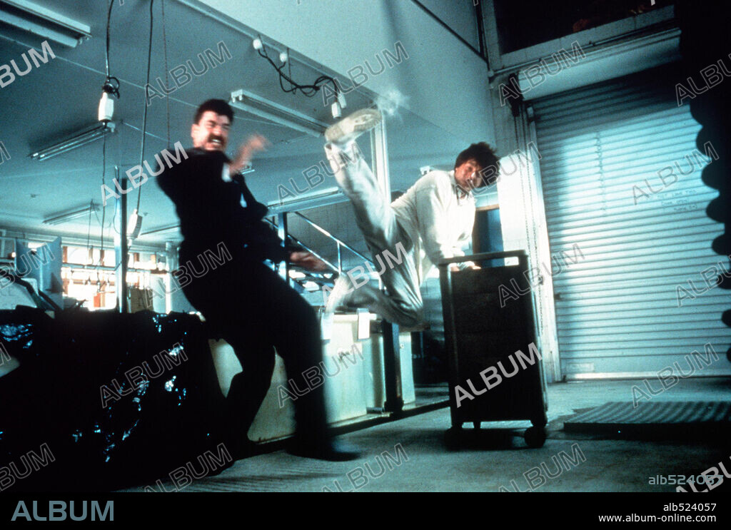 JACKIE CHAN in JACKIE CHAN'S FIRST STRIKE, 1996 (JING CHA GU SHI IV: JIAN DAN REN WU), directed by STANLEY TONG. Copyright NEW LINE CINEMA.