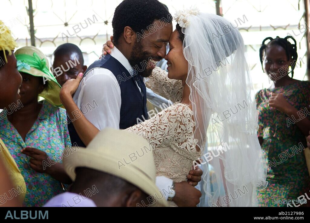 CHIWETEL EJIOFOR and THANDIE NEWTON in HALF OF A YELLOW SUN, 2013, directed by BIYI BANDELE. Copyright BRITISH FILM INSTITUTE.