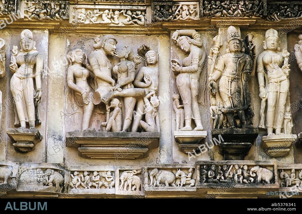 Stone carvings depicting scenes from the Kamasutra, Khajuraho temples, Khajuraho, Madhya Pradesh, India, Asia
