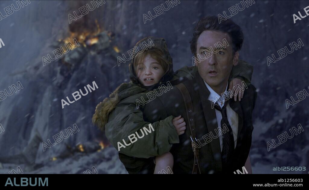 JOHN CUSACK and MORGAN LILY in 2012, 2009, directed by ROLAND EMMERICH. Copyright COLUMBIA PICTURES.