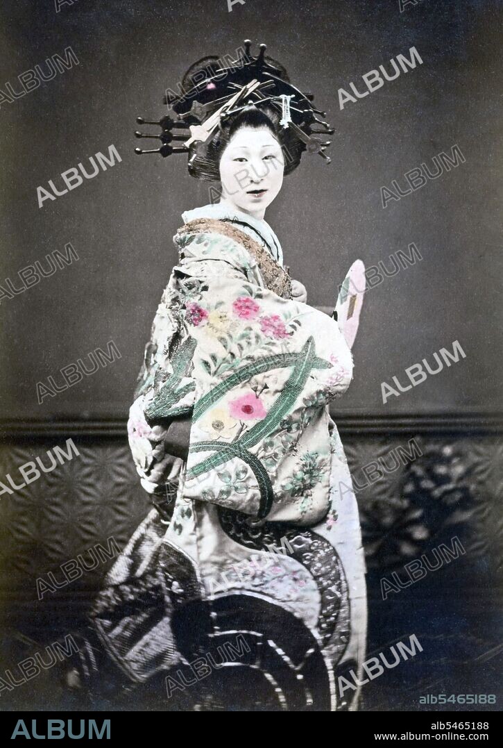 Oiran (??) were the courtesans of Edo period Japan. The oiran were considered a type of yujo (??) 'woman of pleasure' or prostitute. However, they were distinguished from the yujo in that they were entertainers, and many became celebrities of their times outside the pleasure districts. Their art and fashions often set trends among the wealthy and, because of this, cultural aspects of oiran traditions continue to be preserved to this day. The oiran arose in the Edo period (1600–1868). At this time, laws were passed restricting brothels to walled districts set some distance from the city center. In the major cities these were the Shimabara in Kyoto, the Shinmachi in Osaka, and the Yoshiwara in Edo (present-day Tokyo). These rapidly grew into large, self-contained 'pleasure quarters' offering all manner of entertainments. Within, a courtesan’s birth rank held no distinction, which was fortunate considering many of the courtesans originated as the daughters of impoverished families who were sold into this lifestyle as indentured servants. Instead, they were categorized based on their beauty, character, education, and artistic ability. Among the oiran, the tayu (??) was considered the highest rank of courtesan and were considered suitable for the daimyo or feudal lords. In the mid-1700s courtesan rankings began to disappear and courtesans of all classes were collectively known simply as 'oiran'. The word oiran comes from the Japanese phrase oira no tokoro no nesan (????????) which translates as 'my elder sister'. When written in Japanese, it consists of two kanji, ? meaning 'flower', and ? meaning 'leader' or 'first', hence 'Leading Flower' or 'First Flower'.