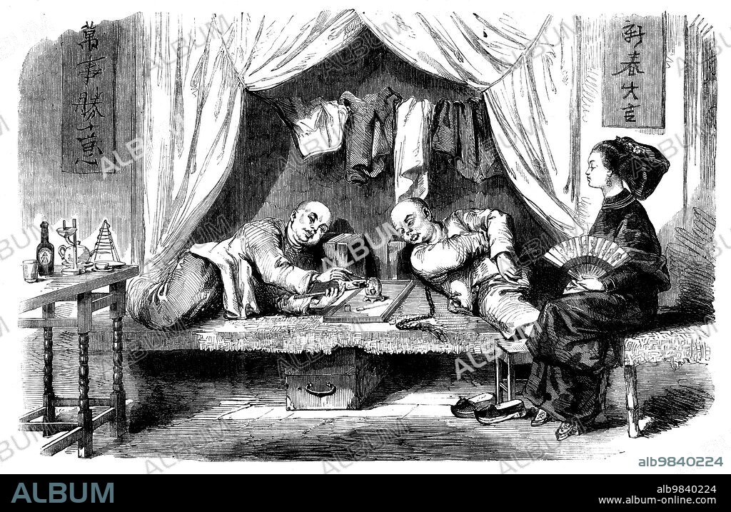Sketches from China - Chinese Opium-smokers, 1858. Note woman on right with bound feet. 'The rooms where the Chinese sit and smoke opium are surrounded by wooden couches, with places for the head to rest upon...The drug is prepared with some kind of incense, and a very small portion is sufficient to charge it, one or two whiffs being the utmost that can be inhaled from a single pipe; the smoke is taken into the lungs, as from the hookah in India. On a beginner one or two pipes will have an effect, but an old stager will continue smoking for hours. At the head of each couch is placed a small lamp, as fire must be applied to the drug during the process of inhaling... A few days of this fearful luxury, when taken to excess, will impart a pallid and haggard look to the features, and a few months, or even weeks, will change the strong and healthy man into little better than an idiot-skeleton...these infatuated people may be seen...laughing and talking under the effect of the pipe...The last scene of this tragic play is generally a room in the rear of the building, a species of morgue, or dead house, where lie those who have passed into the state of bliss the opium-smoker madly seeks - an emblem of the long sleep to which he is blindly hurrying'. From "Illustrated London News", 1858.