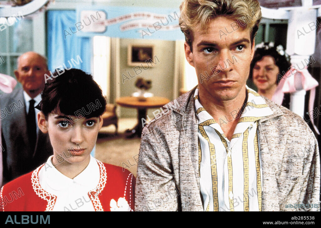 DENNIS QUAID and WINONA RYDER in GREAT BALLS OF FIRE!, 1989, directed by JIM MCBRIDE. Copyright ORION PICTURES.