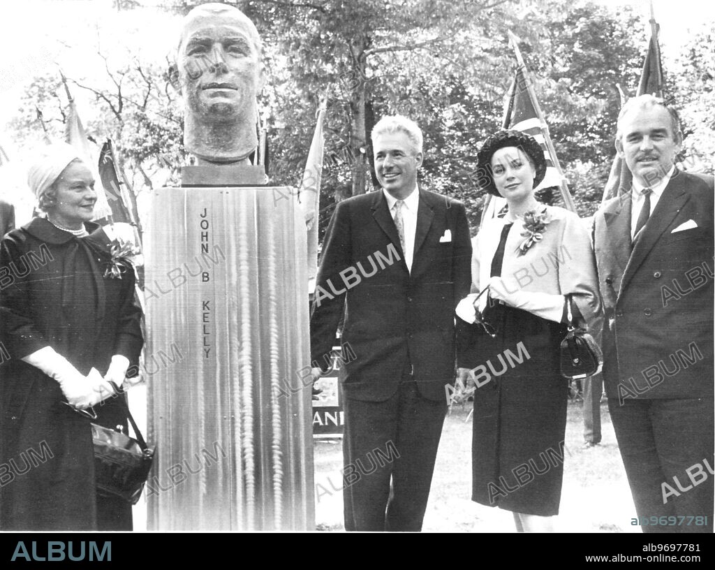 Prince Rainier III and Princess Grace (right and far right) dedicatea bust to the late John B. Kelly, her father. Mrs Kelly and Reginald Beaucane, sculpter are also there. 22.5.1961.