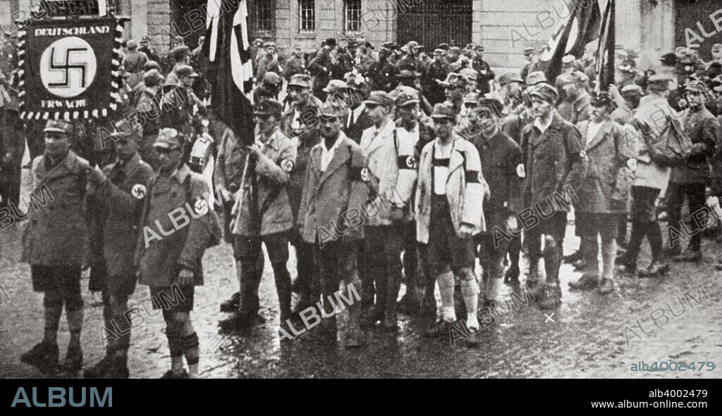 Parade by members of the SA, Weimar, Germany, 1926. Founded in c1919, the Sturmabteilung (SA) was the paramilitary wing of the Nazi party. Its members were known as the 'Brownshirts' because of the colour of their uniforms. The SA played an important part in Hitler's rise to power in Germany but its significance was effectively ended when its leaders were killed in the 'Night of the Long Knives' in 1934, with the rival Schutzstaffel (SS) taking over its role.