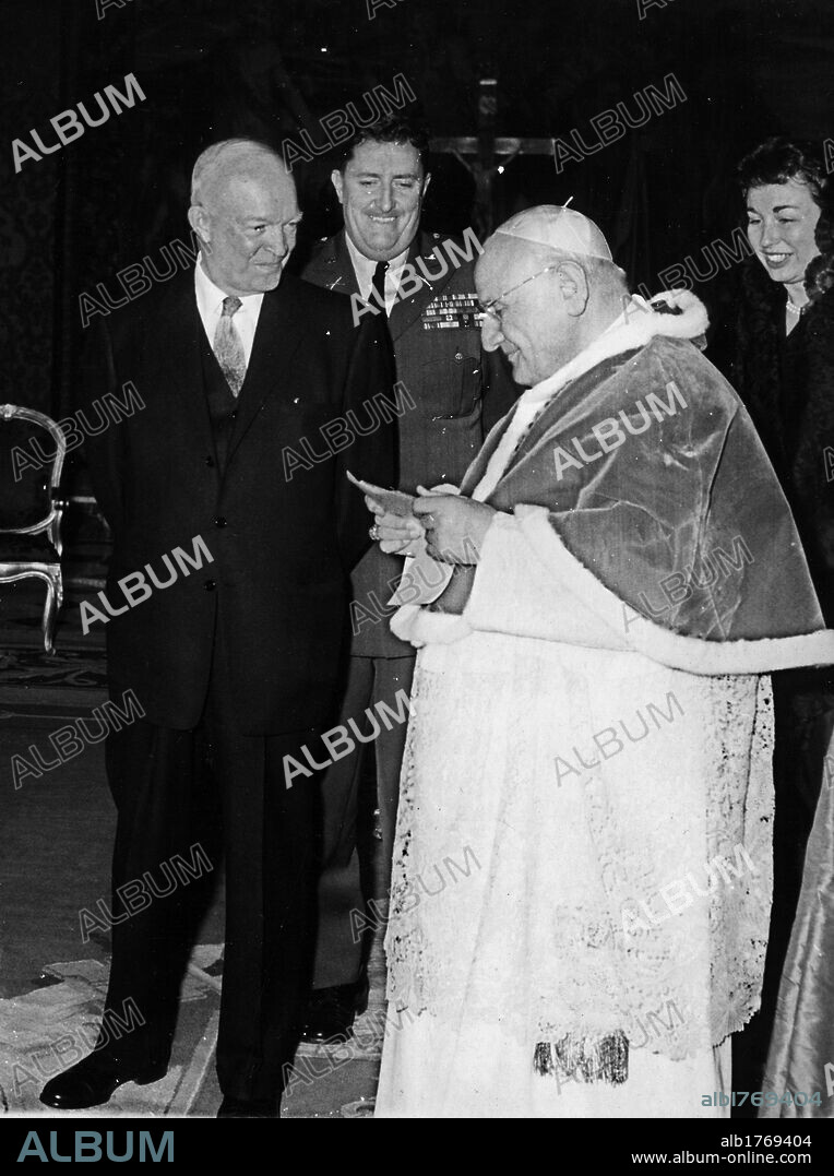 Dwight Eisenhower meeting John XXIII. The President of the United States of America Dwight D. Eisenhower at an audience with Pope John XXIII, together with an official and his daughter-in-law Barbara Eisenhower Thompson. Vatican City, December 1959.
