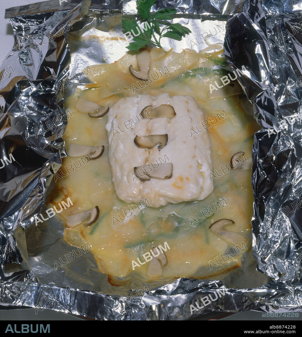 COLA DE MERLUZA AL PAPILLOTE.