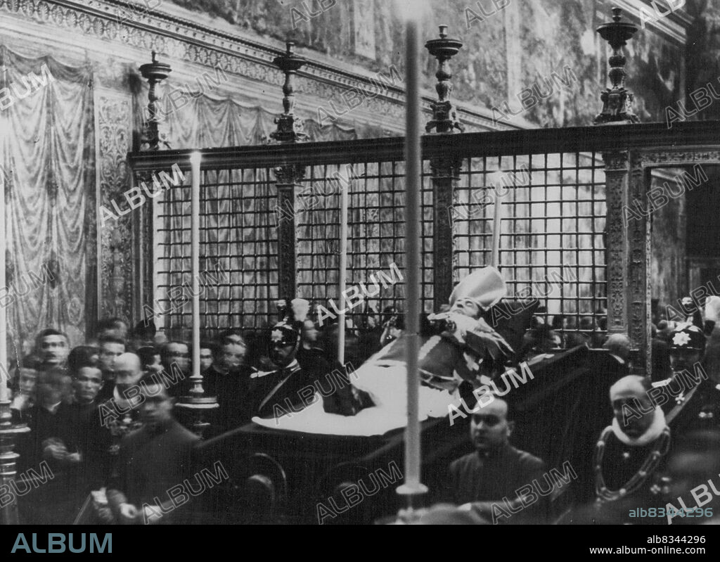 When A Pope Dies
The body of Pope Pius XI lying in state on the dais behind the iron gate which divides the Sistine Chapel of the blessed Sacrament from the rest of St. Peter's. February 10, 1955. (Photo by Paul Popper, Paul Popper Ltd.).