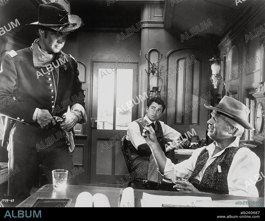 GEORGE PEPPARD and RICHARD WIDMARK in HOW THE WEST WAS WON, 1962, directed by GEORGE MARSHALL, HENRY HATHAWAY, JOHN FORD and RICHARD THORPE. Copyright M.G.M/CINERAMA.