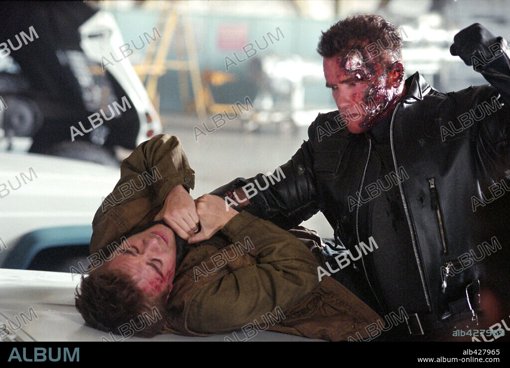 ARNOLD SCHWARZENEGGER and NICK STAHL in TERMINATOR 3: RISE OF THE MACHINES, 2003, directed by JONATHAN MOSTOW. Copyright IMF 3 / ZUCKERMAN, ROBERT.