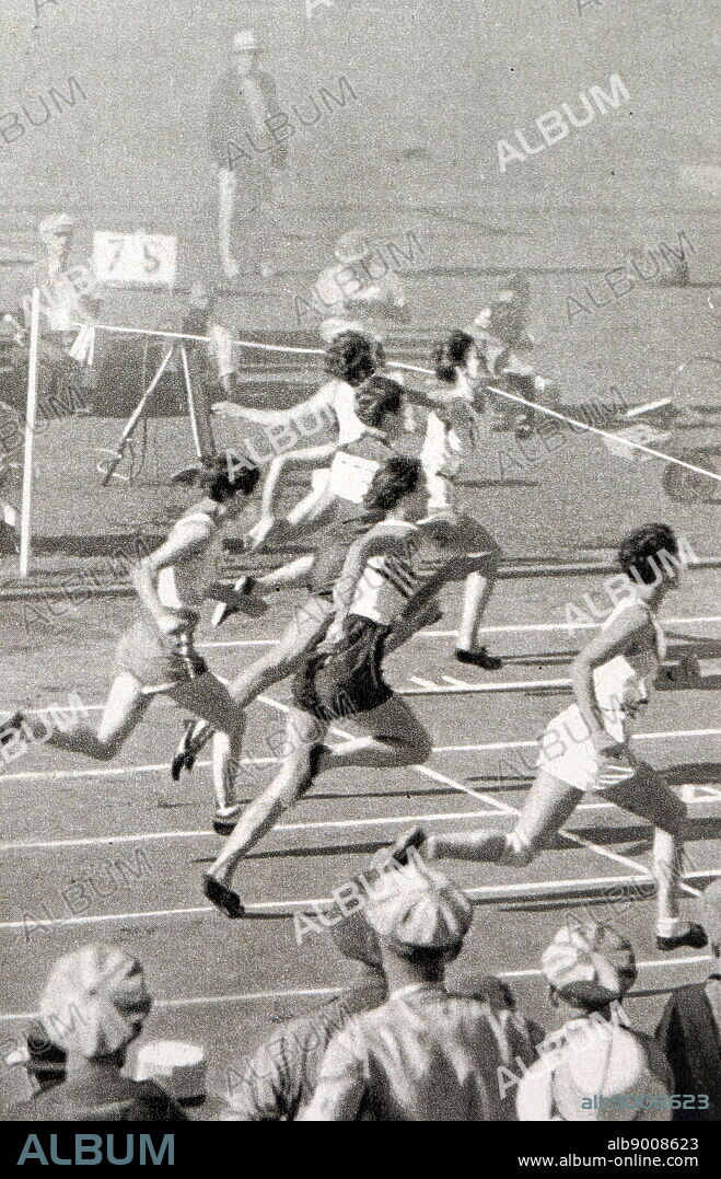Photograph of Mildred Ella "Babe" Didrikson Zaharias (1911 - 1956) winning the 80m Hurdles at the 1932 Olympic games. Babe gained world fame in track and field and All-American status in basketball.