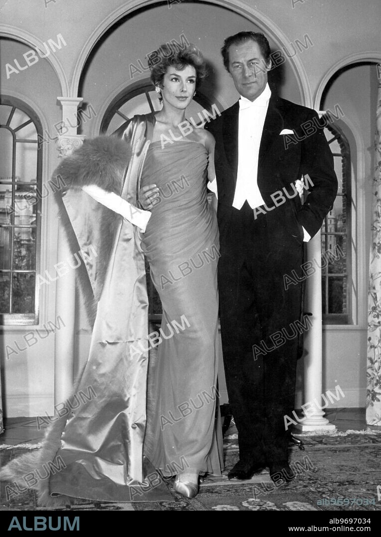 Rex Harrison and Kay Kendall who starred in the film The Re-Luctant Debutante, the dress Kay wears is designed by Balmain February 7th 1958.