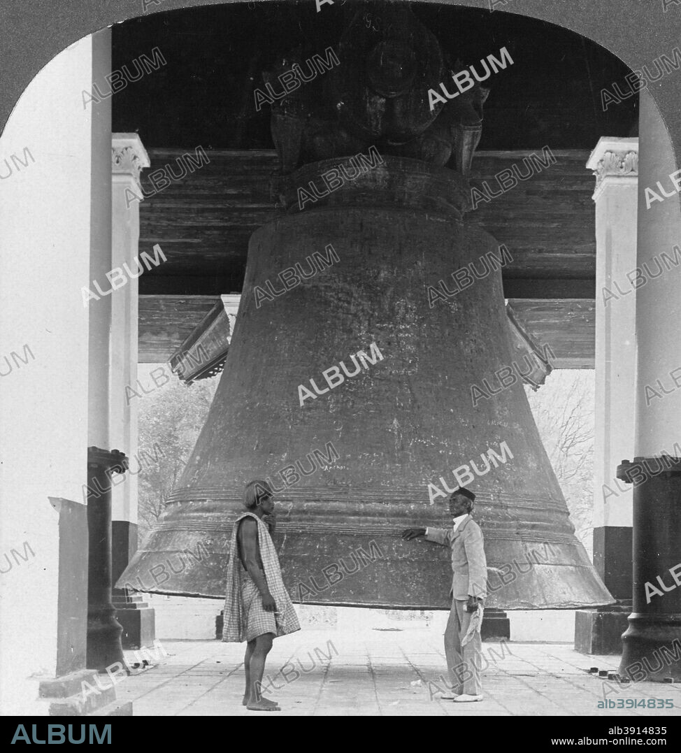 Largest perfect bell in the world, Mingun, Burma, 1908. Weighing 90 tons, the bell was cast in 1808-1810 for King Bodawpaya's stupa, Mingun Pahtodawgyi. It was the largest ringing bell in the world until the completion of the 116-ton Bell of Good Luck at the Foquan Temple, Pingdingshan, Henan, China, in 2000. The Mingun Bell does not have a clapper but is rung by striking its outer rim. Stereoscopic card. Detail.
