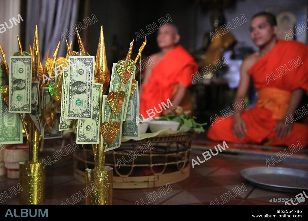 Buddhist money tree to make merit and donate to local temple. Wat Naxai. Vientiane, Laos.