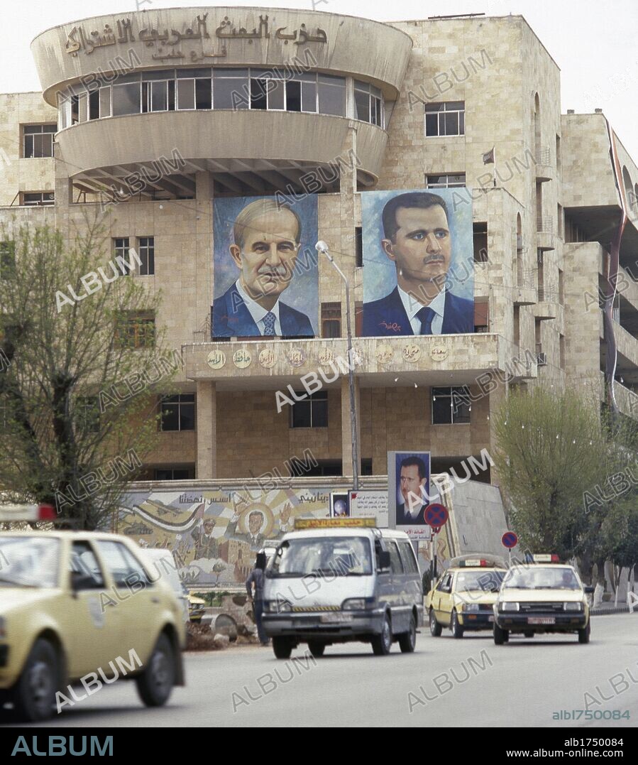 Syria. Damascus. Poster with portraits of presidents Hafez Al-Hassad (1930-2000) and Bashar al-Assad (b. 1965). Photo before Syrian Civil War.