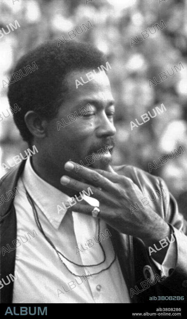 Entitled: "Cleaver, Minister of Information for the Black Panther Party and presidential candidate for the Peace and Freedom Party speaking at the Woods-Brown Outdoor Theatre, American University. Leroy Eldridge Cleaver (August 31, 1935 - May 1, 1998) was an African-American writer, political activist, and convicted rapist. As editor of the official Panther's newspaper, his influence on the direction of the Party was rivaled only by founders Huey P. Newton and Bobby Seale. A self-confessed serial rapist who specifically targeted white women, and reformed racist, Cleaver wrote Soul On Ice (1968) a collection of essays. In the essays, he traces his own development from a "supermasculine menial" to a radical black liberationist. After spending seven years in exile in Cuba, Algeria, and France, he returned to the US in 1975, where he became involved in various religious groups, as well as becoming a conservative Republican, appearing at Republican events. He died in 1998, at the age of 62. His family asked that the hospital not reveal the cause of death, although he was known to have diabetes and prostate cancer. Photographed by Marion S. Trikosko October 18, 1968.
