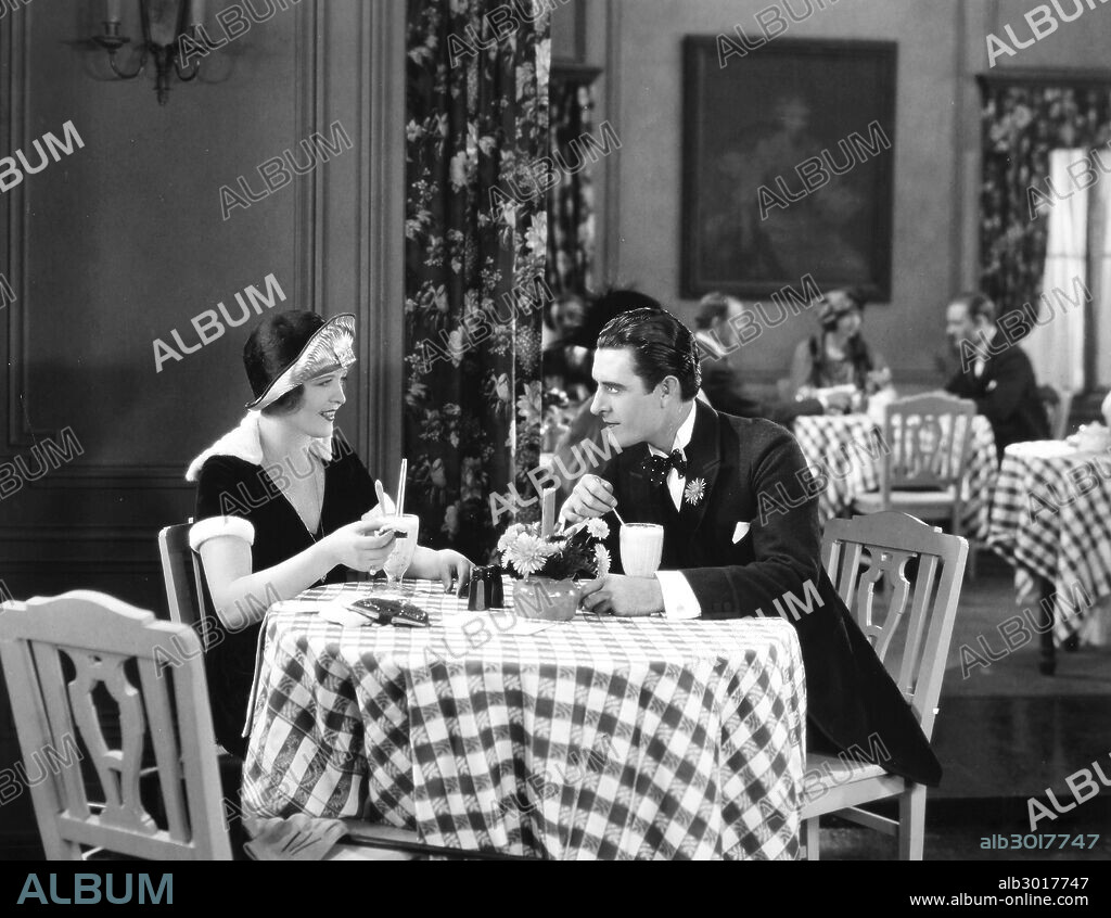 THE SNOB, 1924.Phyllis Haver and John Gilbert in a scene from the film.