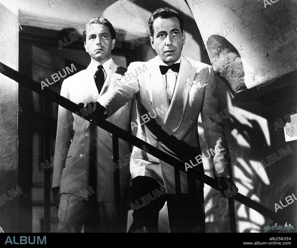 HUMPHREY BOGART and PAUL HENREID in CASABLANCA, 1942, directed by MICHAEL CURTIZ. Copyright WARNER BROTHERS.