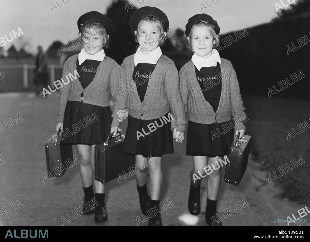 Pauline (left) Pamela (centre) and Patricia Koller, Papatoetoe triplets setting out for their first day at school - see other picture. June 27, 1949. (Photo by The "N.Z. Herald").