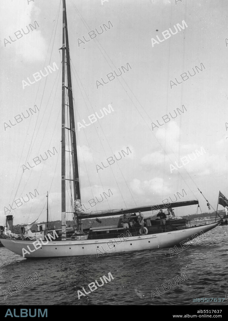 Trans Tasman yacht race.Tara, second competitor to enter Sydney Heads at anchor passing finishing line. February 8, 1951. (Photo by Associated Newspapers Ltd.).
