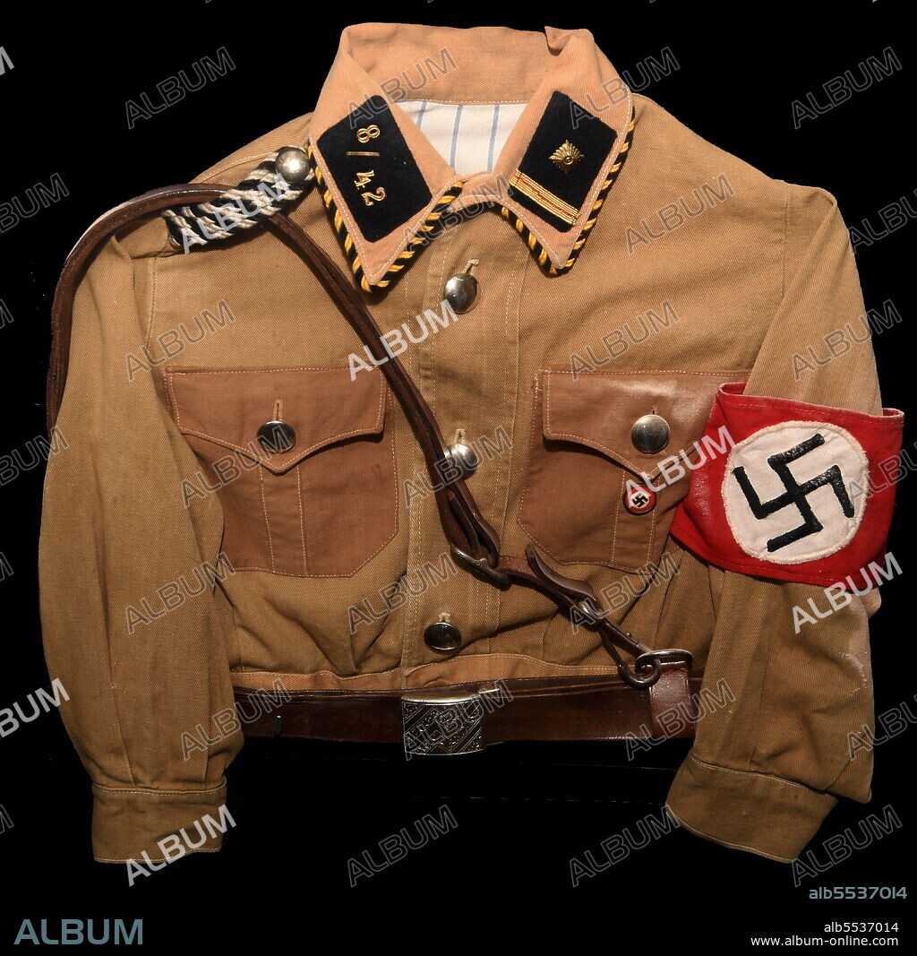 Uniform of a boy cadet of the Sturmabteilung, SA (Storm Detachment) the Nazi Party's original paramilitary wing. It played a significant role in Adolf Hitler's rise to power in the 1920s and 1930s. The SA were colloquially called Brownshirts (Braunhemden) because of the colour of their uniform's shirts, 1936.