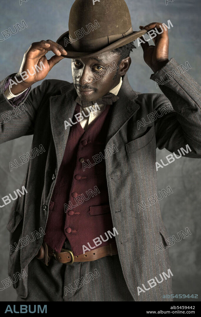IBRAHIM KOMA in AROUND THE WORLD IN 80 DAYS, 2021, directed by BRIAN KELLY and STEVE BARRON. Copyright Federation Entertainment.