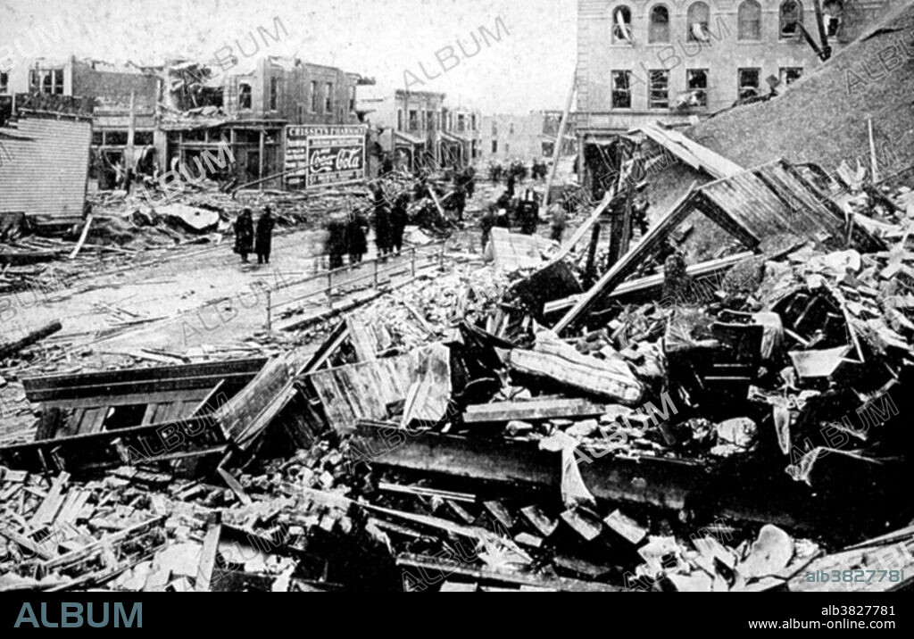 Tornado damage at Omaha. 154 killed and over 3000 left homeless. Omaha, Nebraska, March 23, 1913. A tornado is a violent, dangerous, rotating column of air that is in contact with both the surface of the earth and a cumulonimbus cloud or, in rare cases, the base of a cumulus cloud. They are often referred to as a twister or a cyclone, although the word cyclone is used in meteorology in a wider sense, to name any closed low pressure circulation. Tornadoes come in many shapes and sizes, but are typically in the form of a visible condensation funnel, whose narrow end touches the earth and is often encircled by a cloud of debris and dust. Most tornadoes have wind speeds less than 110 miles per hour (177 km/h), are approximately 250 feet (80 m) across, and travel a few miles (several kilometers) before dissipating. The most extreme tornadoes can attain wind speeds of more than 300 mph (480 km/h), stretch more than two miles (3 km) across, and stay on the ground for dozens of miles (more than 100 km).