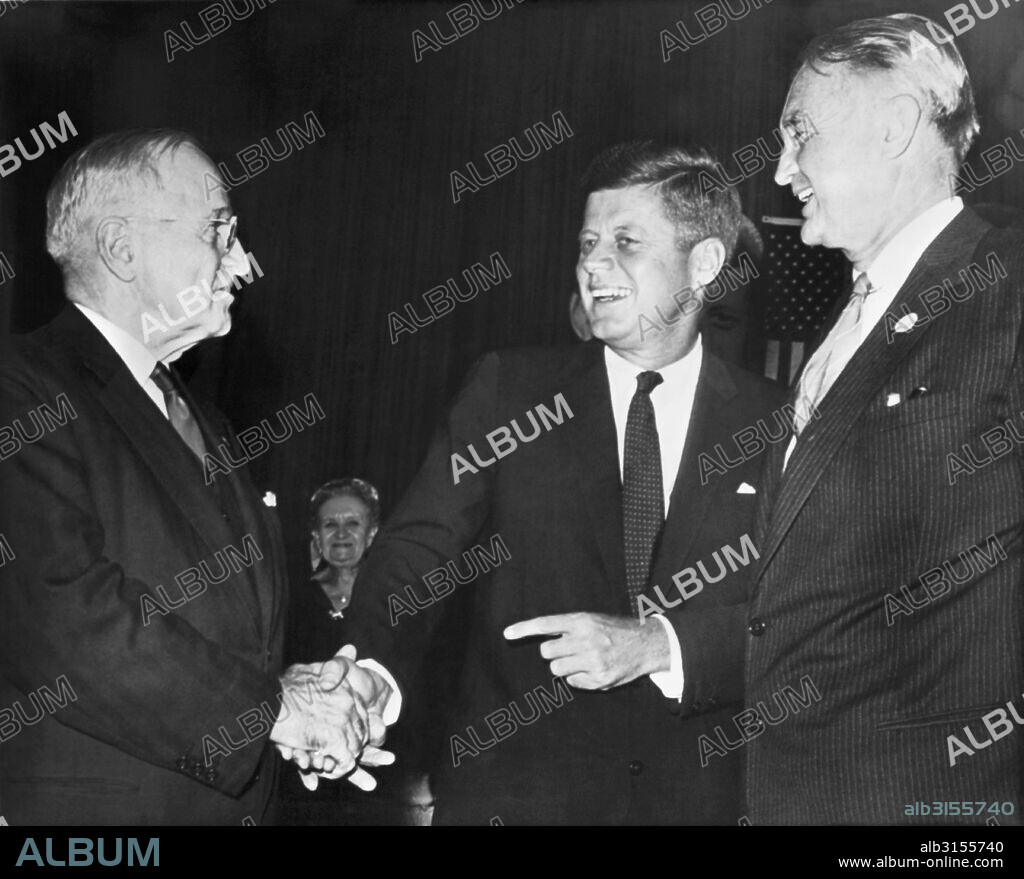 St. Louis, MIssouri:  October 3, 1960 Former President Harry S. Truman greets Senator John F. Kennedy as the Democratic candidate for President arrives for a speaking engagement. Senator Stuart Symington is at right.