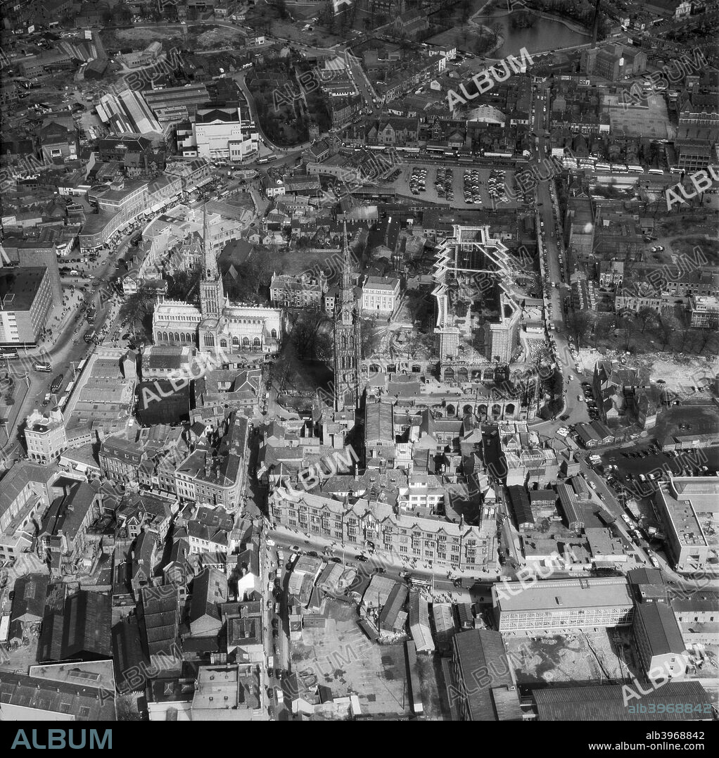 Coventry Cathedral, Warwickshire, 1959. Sir Basil Spence's new cathedral beginning to take shape next to the shell of the old cathedral bombed by the Luftwaffe in the Second World War.