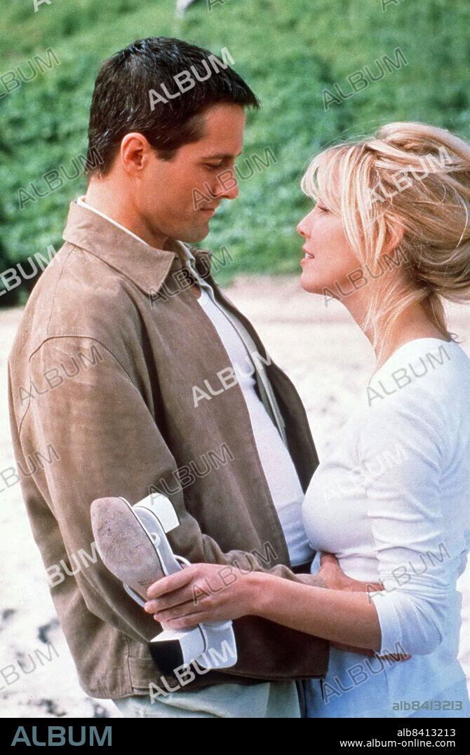 HEATHER LOCKLEAR and ROB ESTES in MELROSE PLACE, 1992, directed by ANSON WILLIAMS, CHARLES CORRELL and RICHARD LANG. Copyright FOX TELEVISION NETWORK/SPELLING TELEVISION.