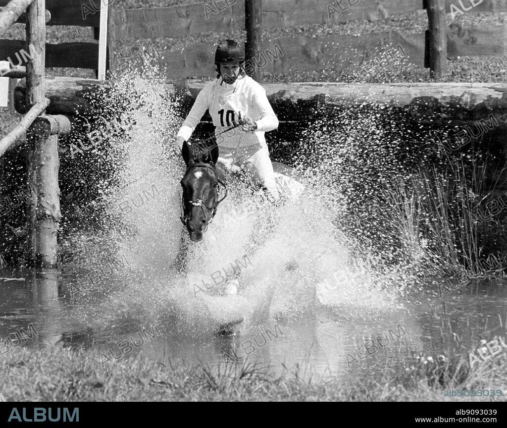September 1972: Munich Olympics: Bridget Parker takes the water jump during the cross-country stage on the horse, 'Cornish Gold' in the 3-day event. She finished 10th after the dressage and cross-country events.