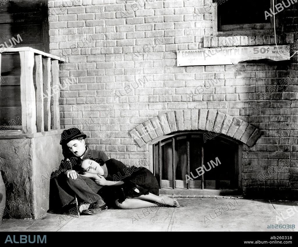 CHARLIE CHAPLIN und PAULETTE GODDARD in MODERN TIMES, 1936, unter der Regie von CHARLES CHAPLIN. Copyright CHAPLIN/UNITED ARTISTS.