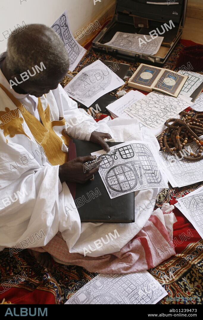 Marabout at work, Mbour, Thies, Senegal, West Africa, Africa.
