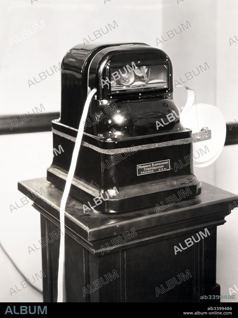 Chicago, Illinois:  April, 1926 The new stock exchange ticker tape machine manufactured by the Morkrum Kleinschmidt Corporation,.