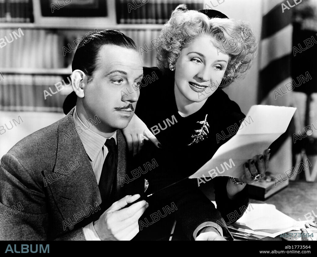 MELVYN DOUGLAS and NORMA SHEARER in WE WERE DANCING, 1942, directed by ROBERT Z. LEONARD. Copyright M.G.M.