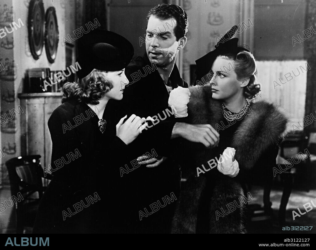 FRED MACMURRAY, MADELEINE CARROLL and SHIRLEY ROSS in CAFE SOCIETY, 1939, directed by EDWARD H. GRIFFITH. Copyright PARAMOUNT PICTURES.