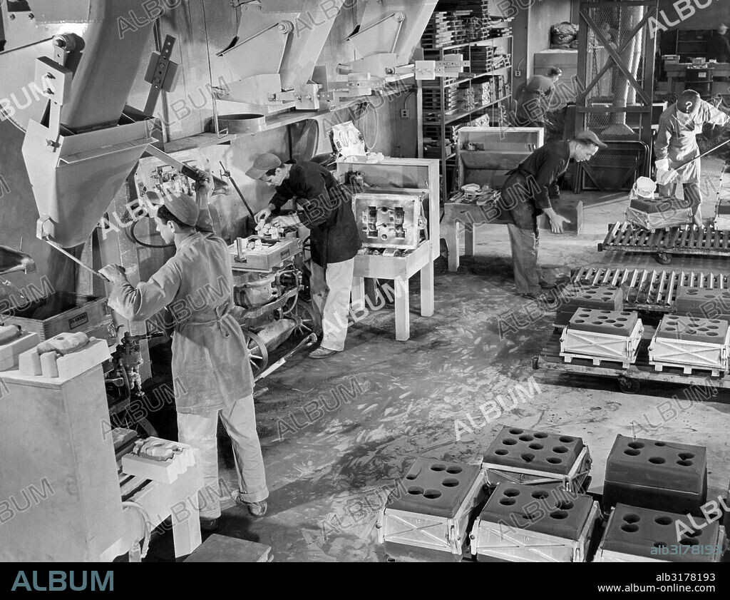 Los Angeles, California:  c. 1955 Workers in the precision casting foundry section at the AiResearch Manufacturing Company.   © Underwood Archives / The Image Works.