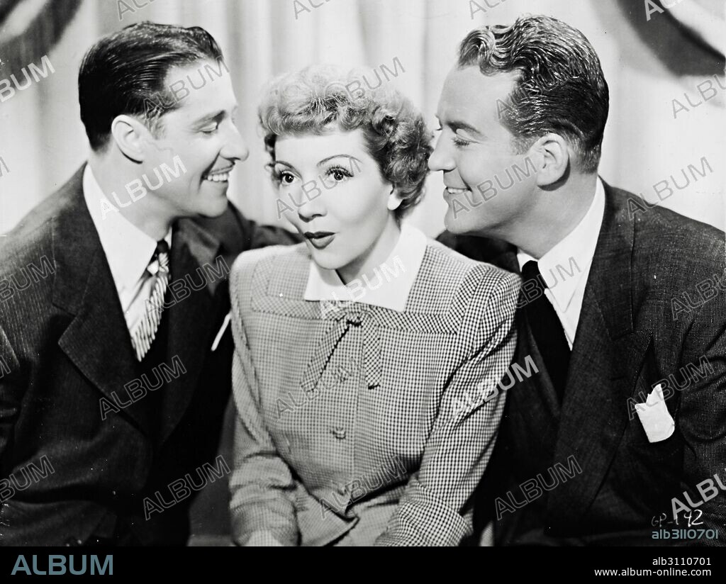 CLAUDETTE COLBERT, DICK FORAN and DON AMECHE in GUEST WIFE, 1945, directed by SAM WOOD. Copyright UNITED ARTISTS.