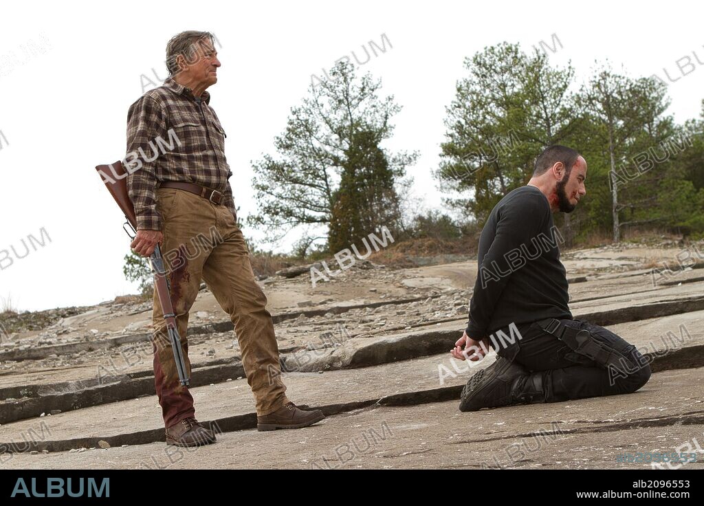 JOHN TRAVOLTA and ROBERT DE NIRO in KILLING SEASON, 2013, directed by MARK STEVEN JOHNSON. Copyright MILLENNIUM FILMS.