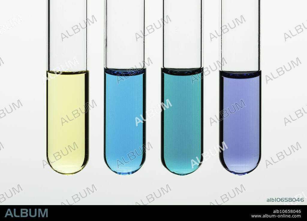Vanadium oxidation states. Vanadium can exist in four adjacent oxidation states (2-5) that produce solutions of different colours. Here left test tube contains solution of ammonium metavanadate (NH4VO3) where vanadium is in +5 oxidation state ((VO3)-). Next solutions (left to right) were obtained by reducing ammonium metavanadate using zinc amalgam as a catalyst: vanadium (IV) ((VO)2+, blue), vanadium (III) (V3+, green) and vanadium (II) (V2+, purple).