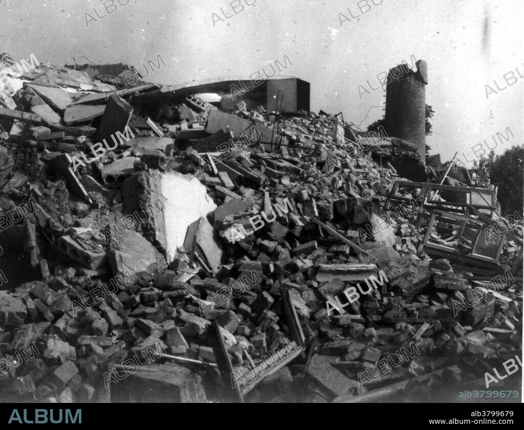 Tangshan, China, Earthquake July 27 UTC (local time July 28), 1976. The Tangshan People's Bank, a four story concrete and brick building, collapsed completely during the earthquake. This earthquake occurred in the northeastern part of China, near the coast. The epicenter was centered about 140 kilometers southeast of Beijing, in the vicinity of Tangshan. The first earthquake, magnitude 7.5, was followed by a major aftershock 15 hours later. According to official sources, the two earthquakes killed 242,769 people, although some estimates of the death toll are as high as 655,000. Over 799,000 people were injured. Aftershocks in the 5.0-5.5 range continued after the main shock. Damage extended as far as Beijing.