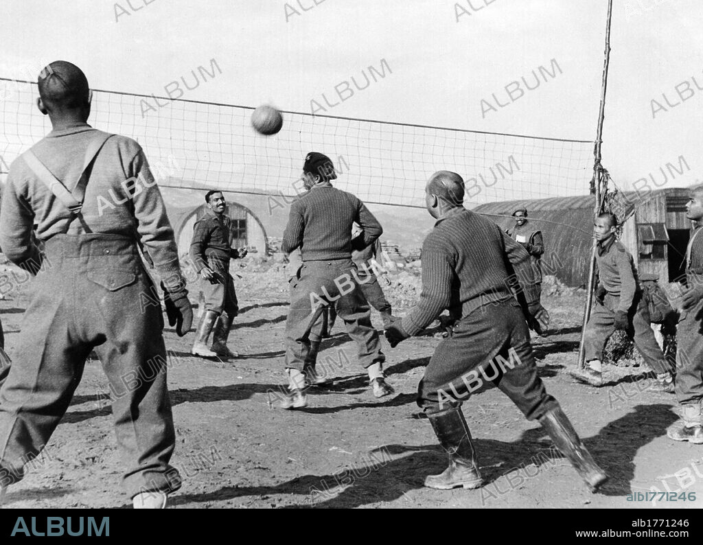 Soldiers of the Brigade of Gurkas playing volleyball. Soldiers of the Brigade of Gurkas of the British army playing volleyball behind the lines. Italy, November, 1944.