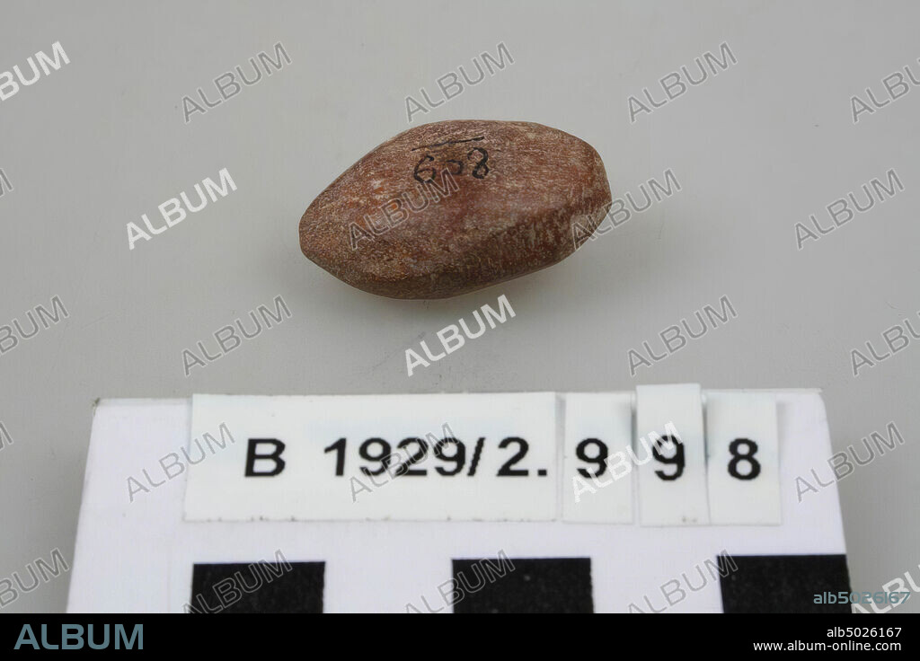 An egg shaped stone with flattened edges probably used as polishing stone., Polishing stone, stone, hematite (?), L 2.9 cm, D 1.7 cm, Palestine.