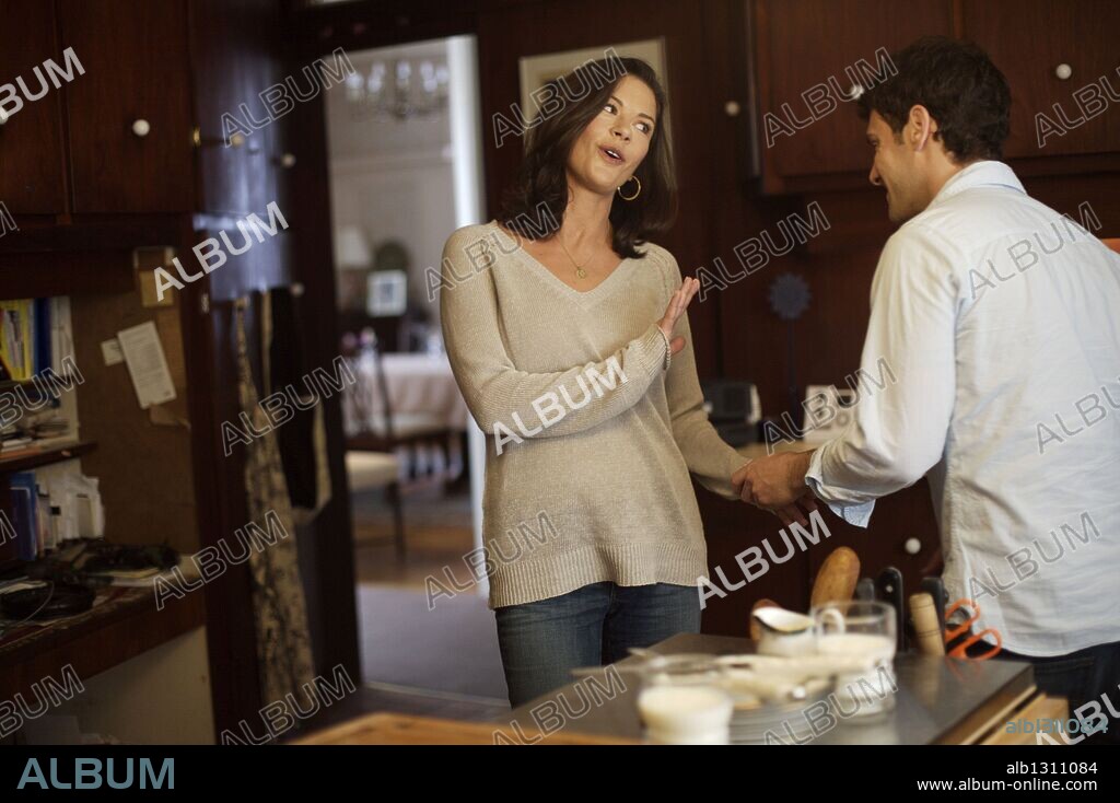 CATHERINE ZETA-JONES and JUSTIN BARTHA in THE REBOUND, 2009, directed by BART FREUNDLICH. Copyright THE FILM DEPARTMENT/PROCESS PRODUCTIONS/A&F PRODUCTIONS.