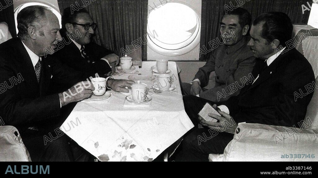 Left to Right: William Rodgers US Secretary of State; Henry Kissinger US National security advisor; Zhou Enlai Chinese Prime Minister and Richard Nixon US President in talks while flying over China 1972.