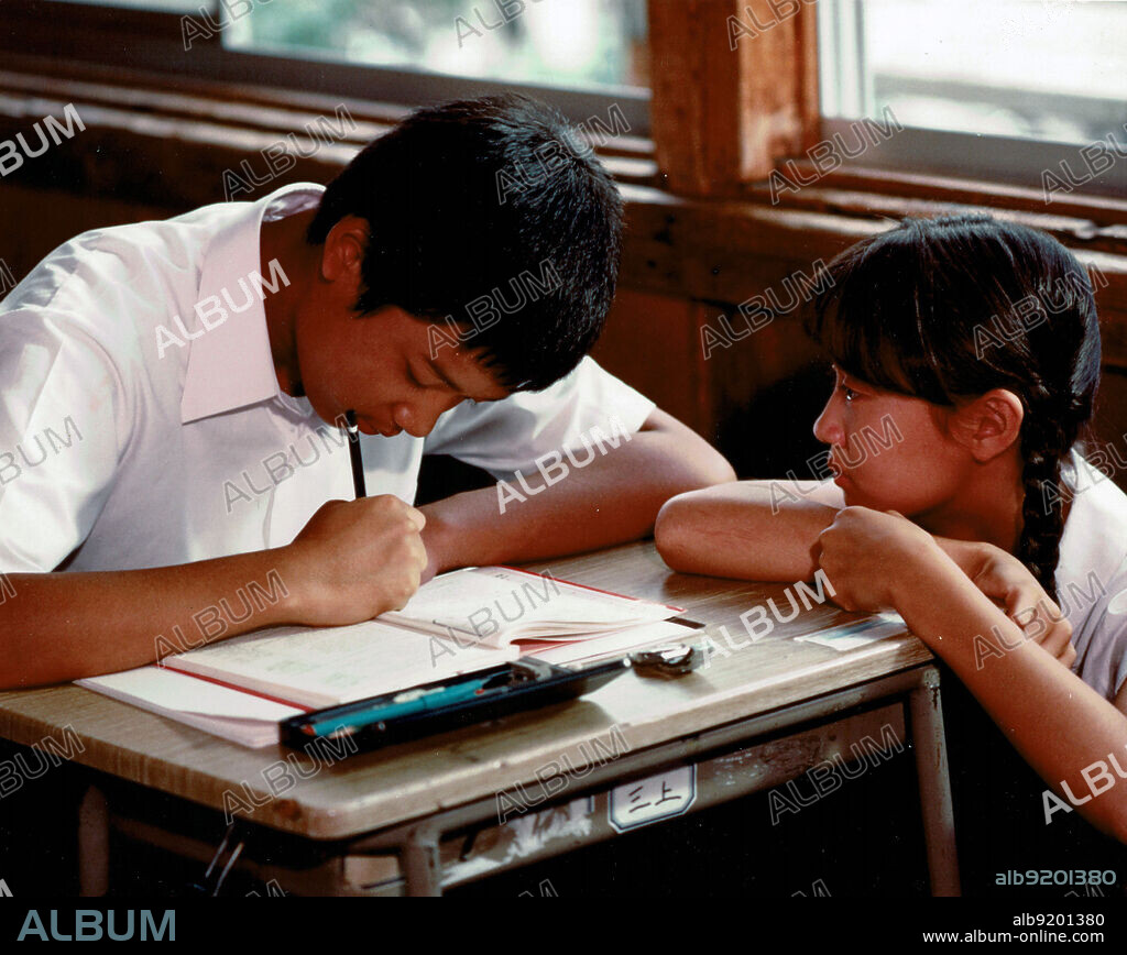 YUICHI MIKAMI and YUKI KUDO in TYPHOON CLUB, 1985 (TAIFU KURABU), directed by SHINJI SOMAI. Copyright Directors Company.